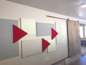 acoustical panels arranged in a pleasing design